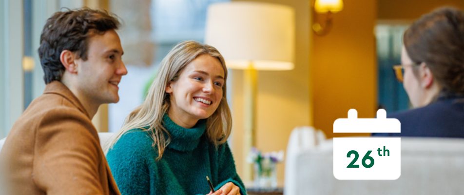 Couple talking with a calendar that says 26th